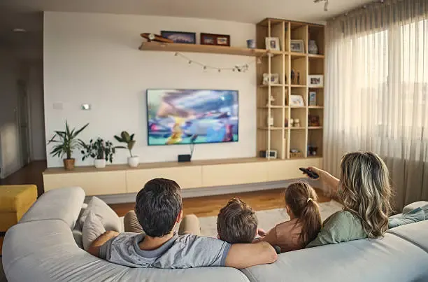 Family Watching TV with Best IPTV Pro